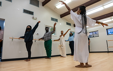 UVI dance professor Djassi DaCosta Johnson demonstrates a move in the new dance studio