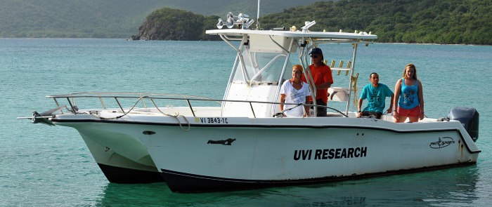 MMES graduate students using the program's research boats