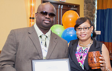 Just Threads owners Cyril and Germene Thomas pose for a photo after their business was named the Small Business of the Year on St. Thomas. 