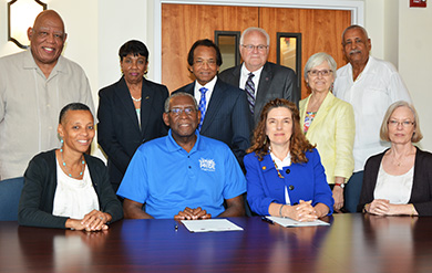 UVI President David Hall and UVI Provost Dr. Camille McKayle pose for a photo with Fielding University officials and UVI administrators and faculty.