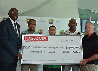 UVI President David Hall, UVI director of the Process Technology Program Eric Douglas,  UVI Process Technology student Alex Cintron,  UVI Process Technology student Thyrone DeCosta and Colman Hanna, vice president of operations at Diageo USVI pose for a photo. 