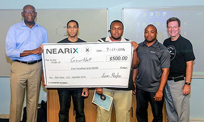 Dr. David Hall, Eliakin del Rosario, A.Jodie Dasent, Mr. Leon Hughes, and Dr. Tim Faley pose for a photos after the 2016 HackFest on St. Thomas.