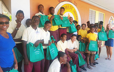 middle school student pose for photo at end of marine debris program