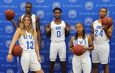 Members of the Bucs Men and Women's Basketball Teams gather for a Photo