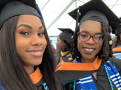 The Henry Sisters display their Smiles as Graduates of the University of the Virgin Islands.