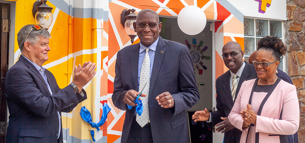 Board Chairman Henry Smock, UVI President David Hall, Senate President Novelle Francis and Childcare Diagnostic Center Director Sherryl Tonge George celebrate after the ribbon is cut to the Inclusive Childcare Laboratory and Diagnostic Center