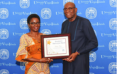 Leslyn Tonge receives President's Award from President David Hall