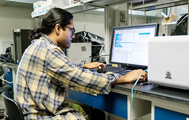 UVI Student Using a Computer