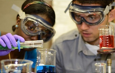 UVI research students conduct an experiement.